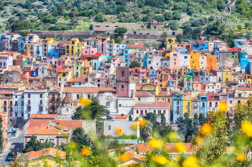 Preview: Unbelivable morning panorama of colourful houses of old town Bosa in Sardinia.