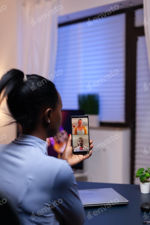 Preview: Happy coworkers talking and consulting each other