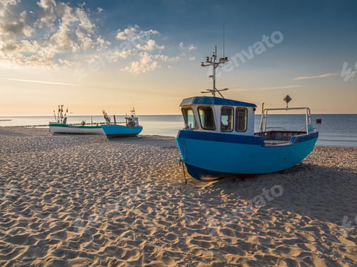 Preview: Milky way and falling stars over boats by Baltic Sea.