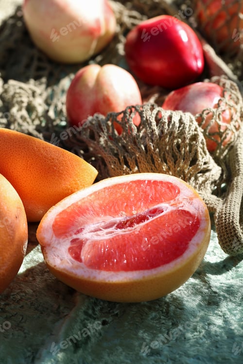 Preview: trendy color combination, pink peaches and grapefruit in reusable , mesh bag. Zero waste