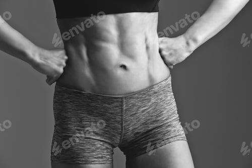 Preview: Close-up of woman muscular torso