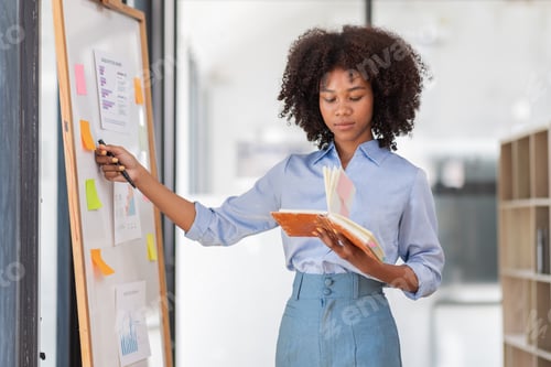 Preview: Woman Planning at Work with Sticky Notes
