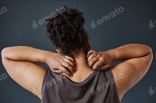 Preview: Black Woman Scratching Neck Back View