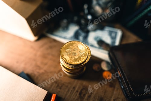 Preview: Bitcoin coins on a wooden desk at home