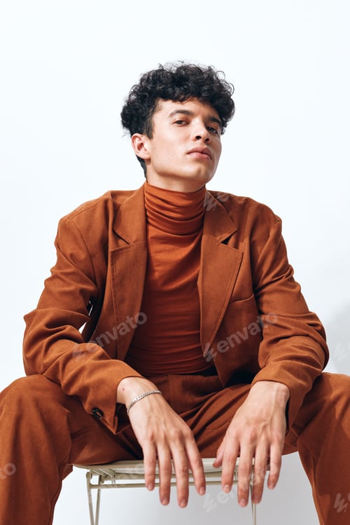 Preview: Man trendy hand smoking student fashion beige confidence thoughtful hipster expression sitting