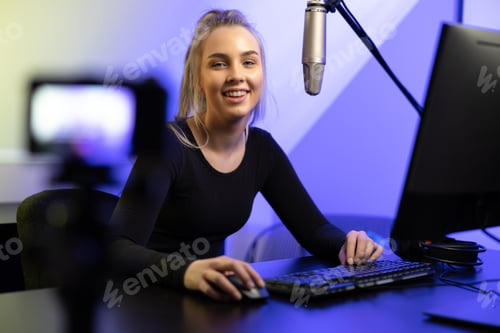 Preview: New Generation Female e-sport gamer streaming vlog online from office