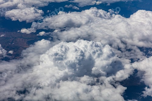 Preview: Cloudscape background. View out of an airplane window.