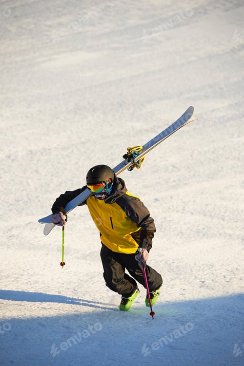 Preview: Skier walking up mountain, Saas-Fee, Valais, Switzerland