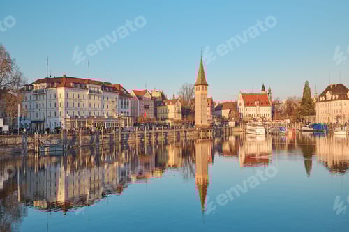 Preview: the view from across a large body of water, with buildings lining the edge and