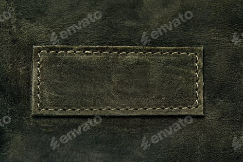 Preview: Elegant dark olive leatherette background. Leather texture. Free space for text.