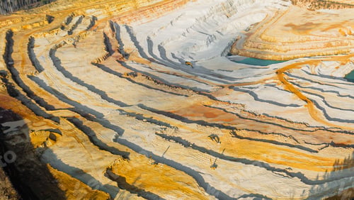Preview: Panoramic view on a sandpit. Mining of ore and natural resources. Top view on a sandy texture