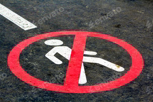 Preview: End of walk way sign on the asphalt road surface