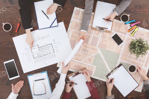 Preview: Architects working on plans