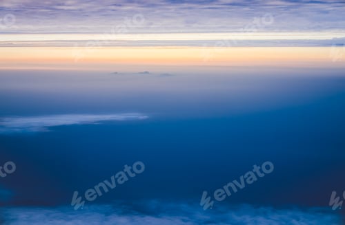 Preview: View sunset with sky and cloudy from airplane window when flying,Nature background