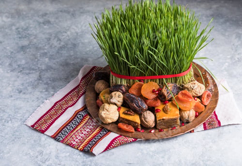 Preview: Novruz setting table decoration, wheat grass, Azerbaijan national pastry pakhlava