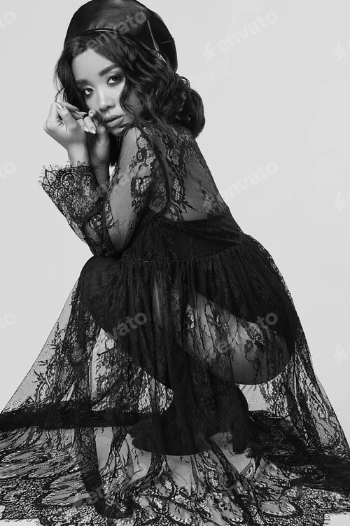 Preview: Glamorous Fashion Portrait Of Beautiful Charming Asian Girl In Black Long Dress And Leather Hat
