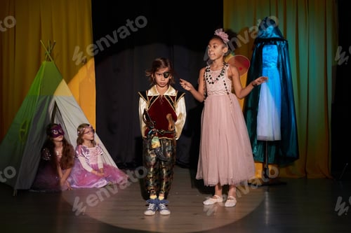 Preview: Boy and Girl Acting on Stage in School Play