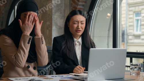 Preview: Two multiracial business women Asian Korean woman girl Muslim Islamic hijab female businesswoman