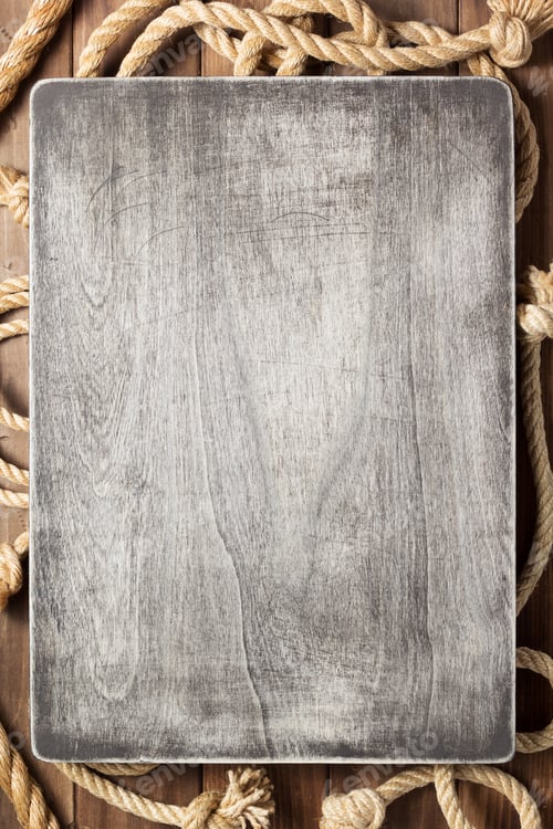 Preview: sign board and ship rope at wooden background