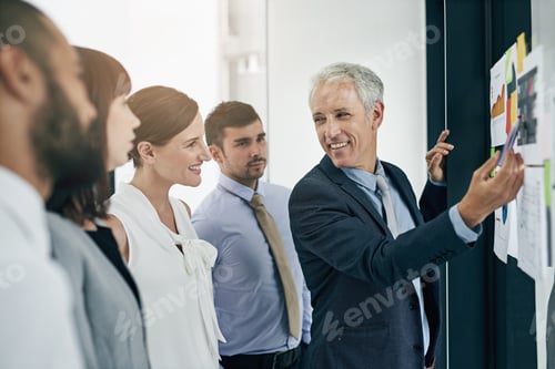 Preview: His presentation is on point. Shot of a man giving a presentation to colleagues in an office.