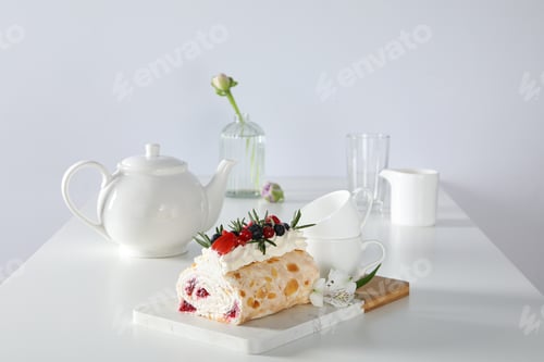 Preview: Elegant Dessert Display with White Teapot and Flowers