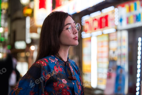Preview: Pretty asian woman portrait with led lights