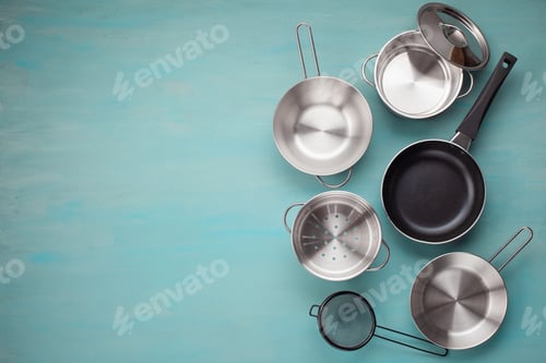 Preview: Set of kitchen metallic pans. Mockup, kitchen utensils, recipe book and cooking classes concept
