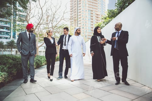 Preview: Mixed business team making agreements on future business plans