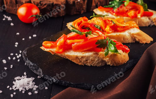Preview: Bruschettas on cutting board close up