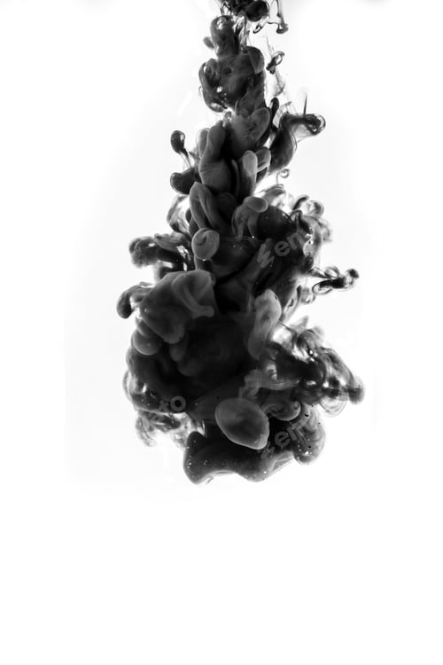 Preview: Black ink falling in the water on white background.