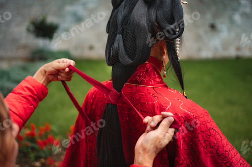 Preview: Bride preparing for traditional Chinese wedding ceremony