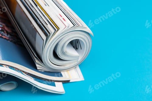 Preview: Glossy magazine with pages rolled
