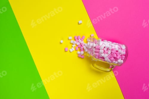 Preview: minimal sweet marshmallow on color background. close up. creative photo