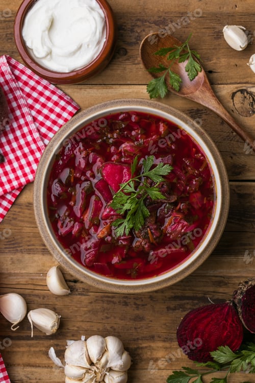 Preview: Traditional ukrainian borscht soup with sour cream and fresh herbs