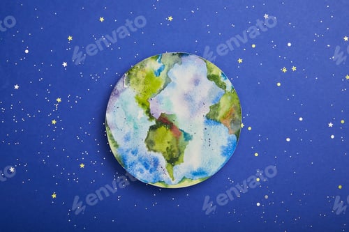 Preview: top view of planet picture on violet background with stars, earth day concept