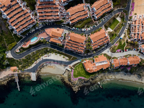 Preview: Aerial top view of sea waves crashing against the shoreline of Hamilton Cove