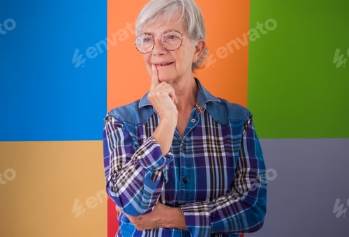 Preview: Portrait of senior beautiful grey-haired woman wearing sport shirt and glasses