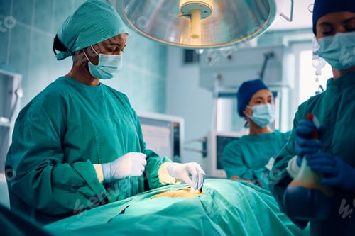 Preview: Medical Team Performing Surgery in Hospital Room