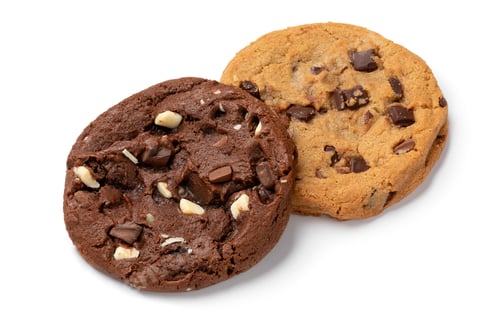 Preview: Pair of homemade sweet American chocolate chip cookies isolated on white background