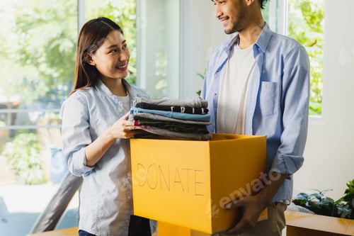 Preview: An Asian couple is helping each other pack their belongings to move to a new house