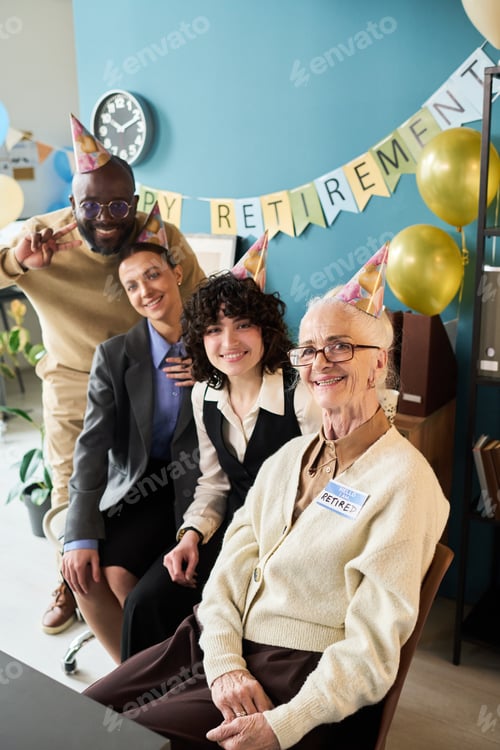 Preview: Senior Caucasian Woman Smiling with Diverse Coworkers Celebrating Retirement