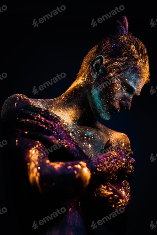 Preview: Portrait of a man painted in fluorescent UV colors.
