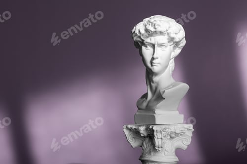 Preview: White marble head of young man, head of famous statue by Michelangelo - David from Florence. Gypsum