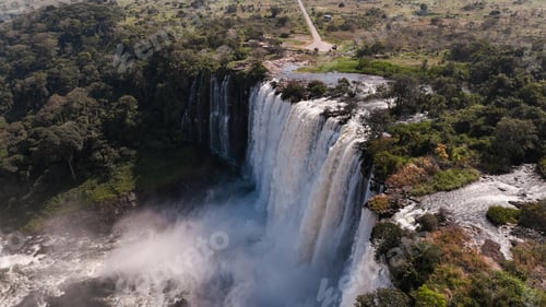 Preview: Kalandula Waterfall cascading down rocky cliffs in Angola