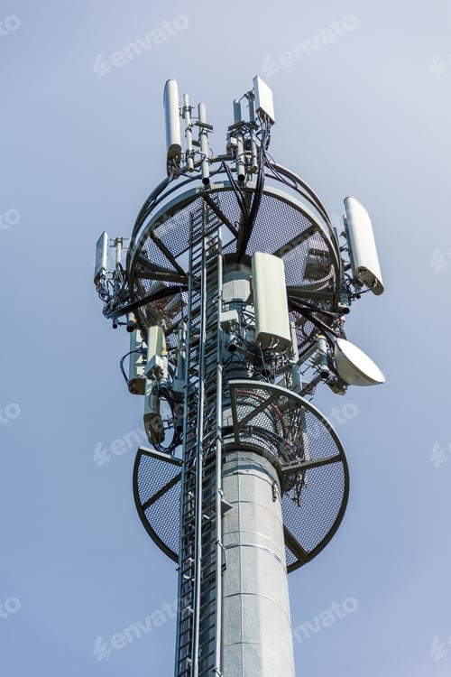 Preview: Vertical low angle shot of a base station with a clear cloudless sky behind