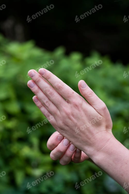 Preview: Close up of a woman's hands, pressing meridian points on the hands, therapy