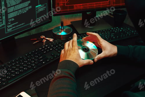 Preview: Close up of programmer of hacker hands typing a code