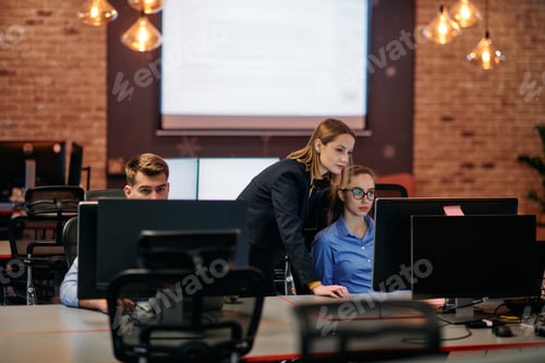 Preview: Strategic Business Meeting: Group of Professionals Collaborating in Office Using Computers