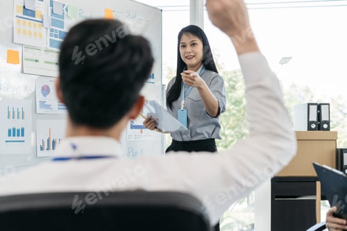 Preview: Business team working on a project in the office or reviewing and discussing a business project.