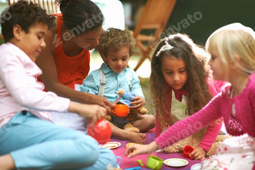 Preview: Mother and four children playing picnics at garden birthday party